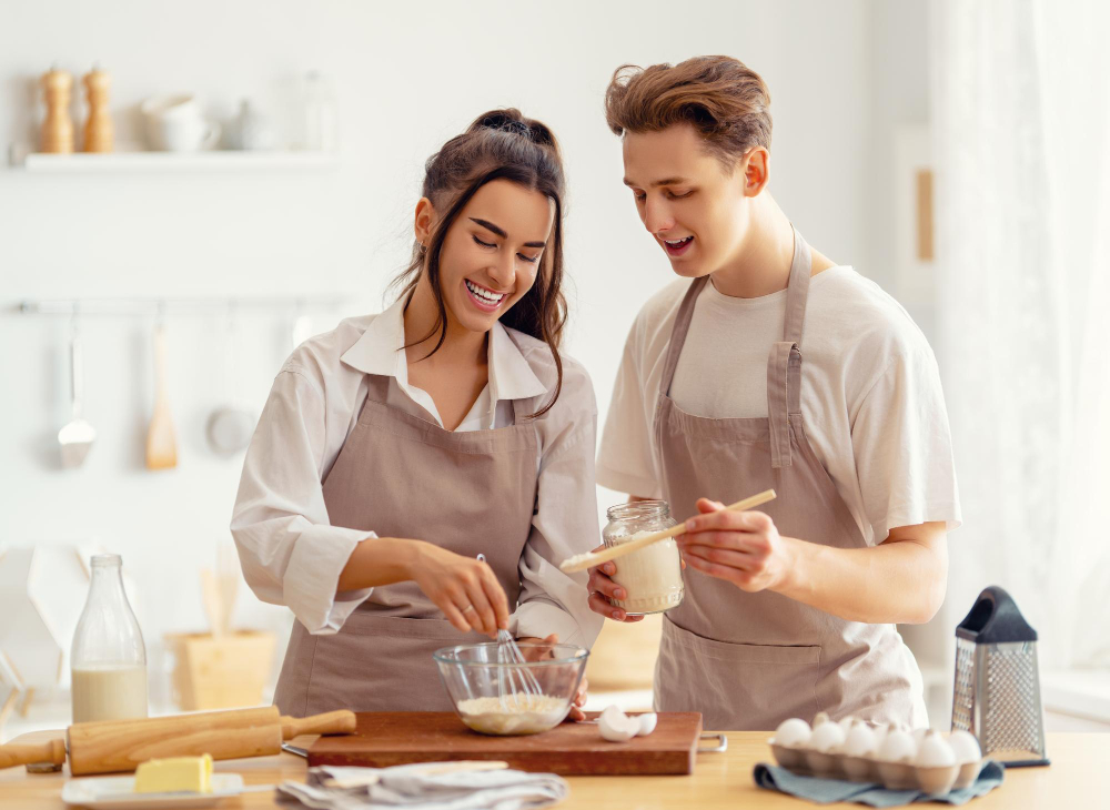 a couple cooking together