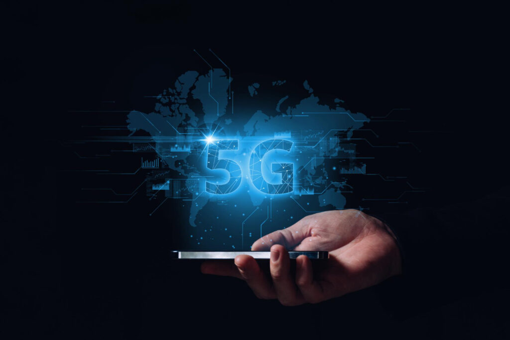 technology-international-modern-networks-5g-background-world-map-hologram-smartphone-hands-person.