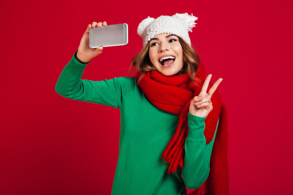 happy woman looking at a phone