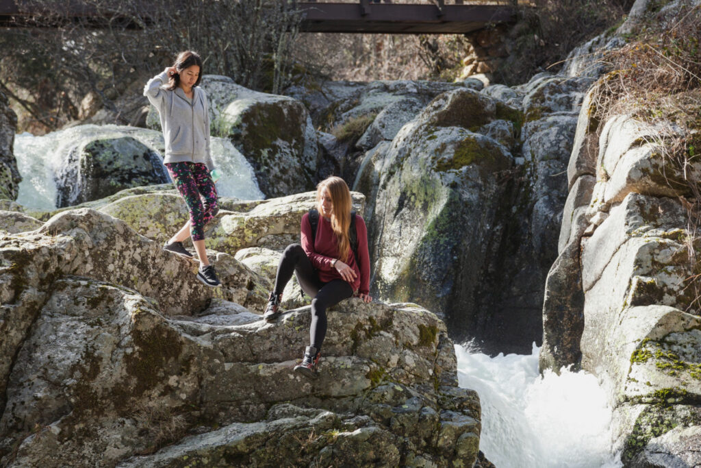 Girls resting by the river